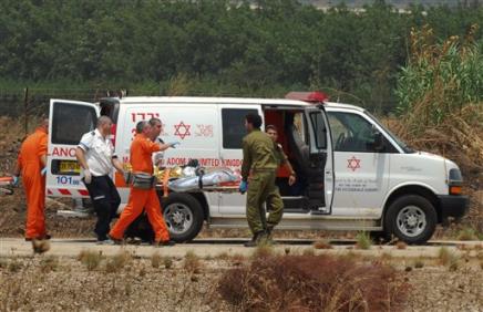1457152555-israeli-soldiers-and-medics-carry-an-israeli-soldier-injured-during.jpg